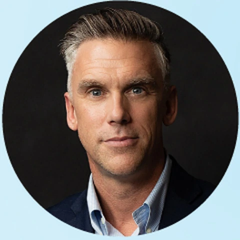 Portrait of Kirk Petroski, founder of SYMX.AI
